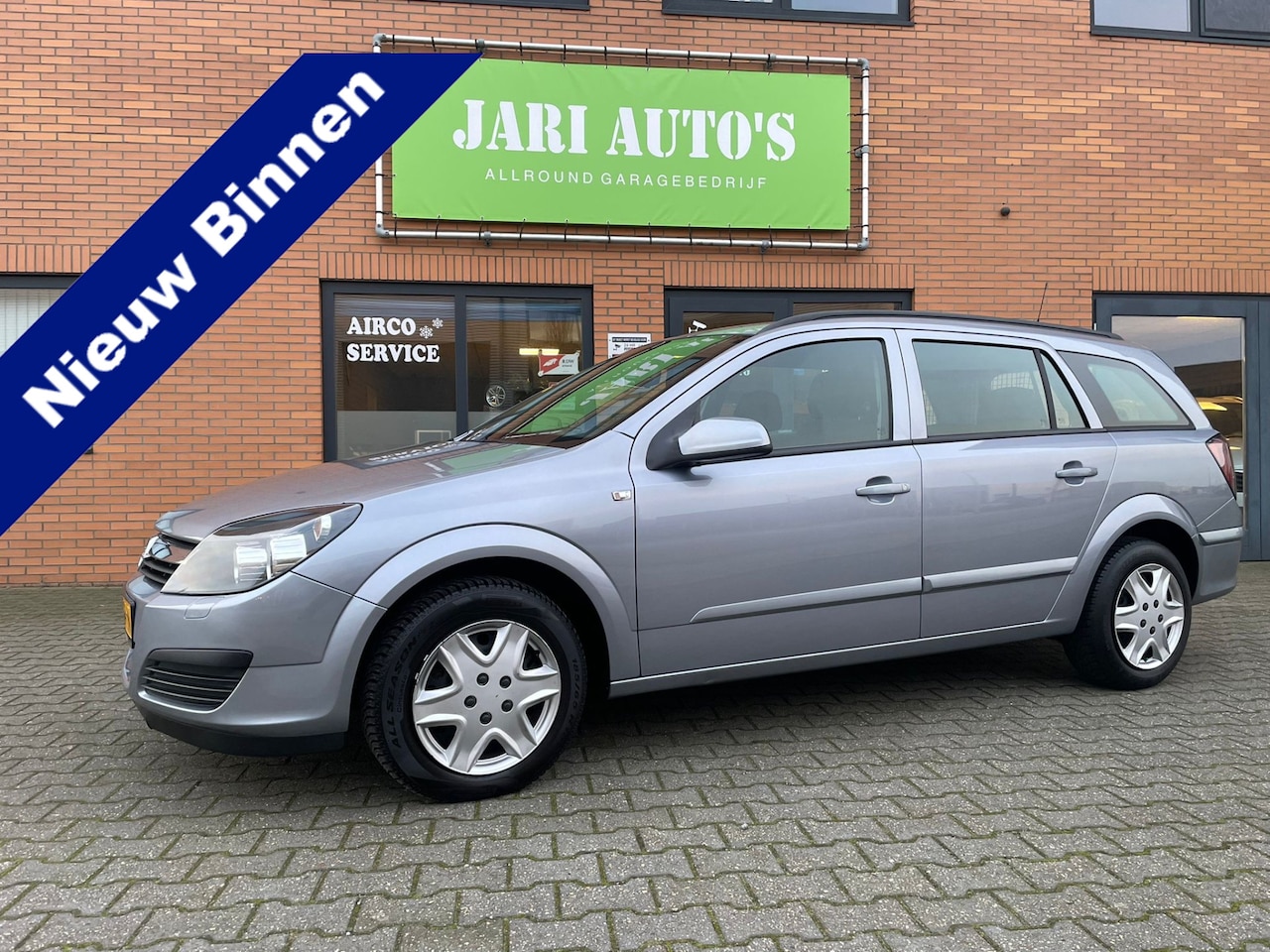 Opel Astra Wagon - 1.6 Essentia Rijdt als nieuw - AutoWereld.nl