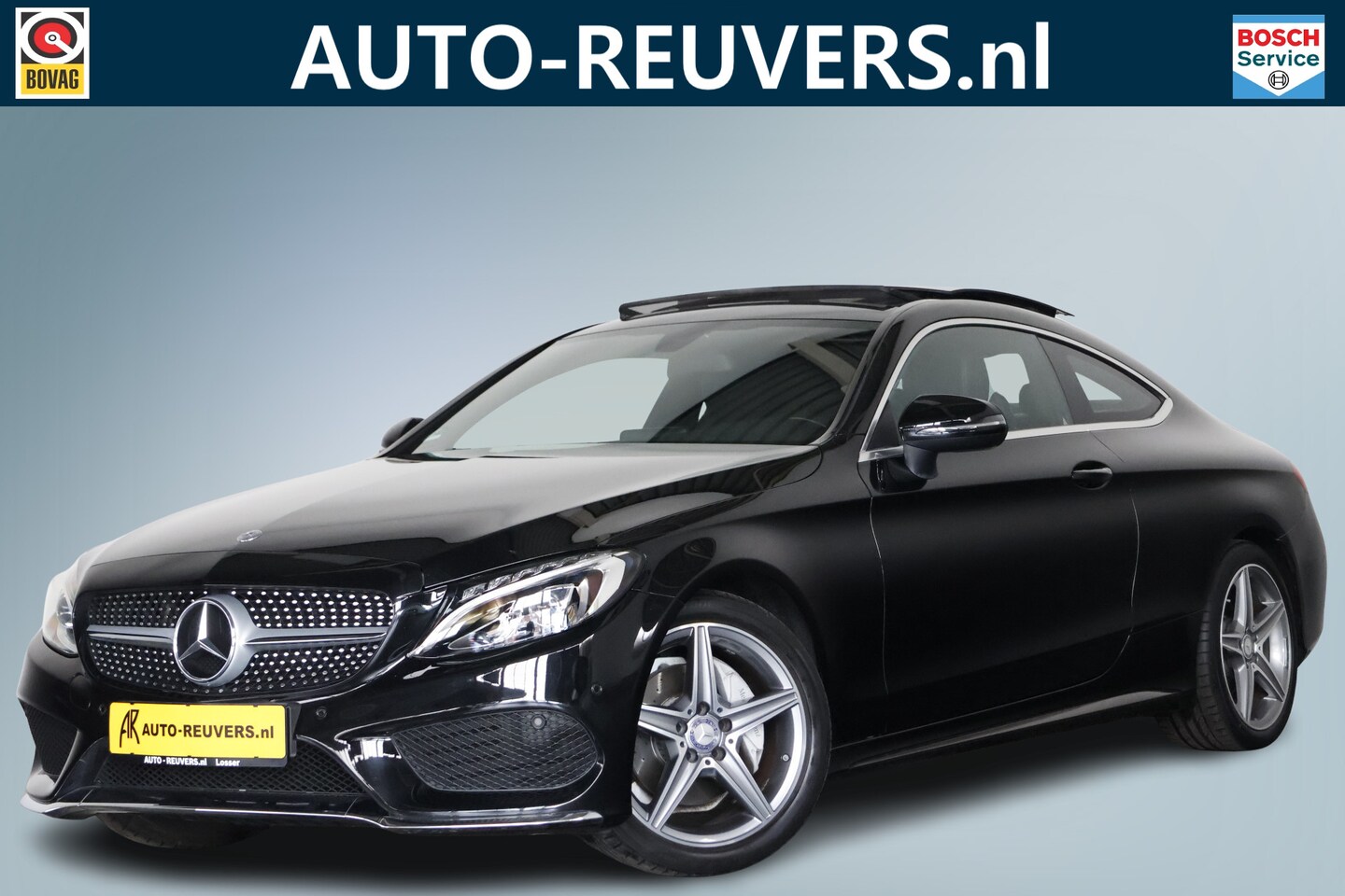 Mercedes-Benz C-klasse Coupé - 180 AMG Line / Opendak / Leder / Navi / LED - AutoWereld.nl