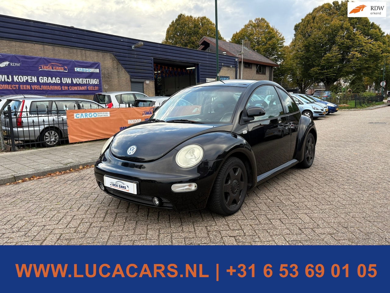Volkswagen New Beetle - 2.0 Highline 2.0 Highline - AutoWereld.nl