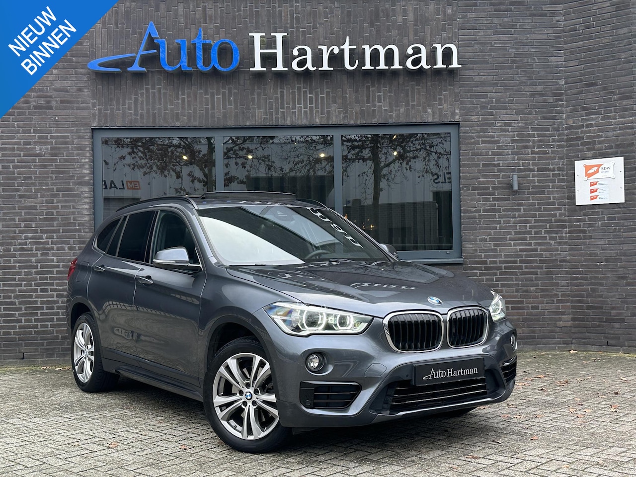 BMW X1 - sDrive20i High Executive LEDER|PANO|HEAD-UP|MEMORY|KEYLESS - AutoWereld.nl