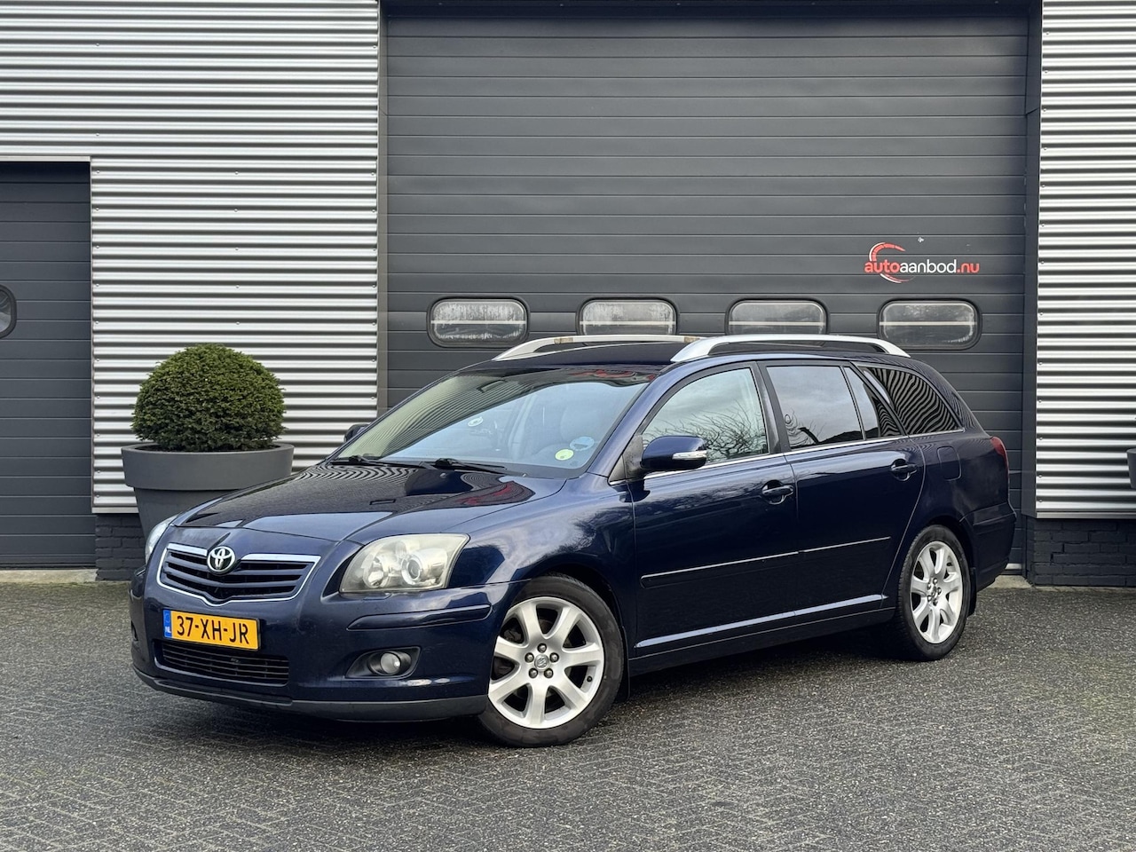 Toyota Avensis Wagon - 2.4 VVTi Executive Business | Navigatie | Trekhaak | Xenon | Privacy Glass | Climate Contr - AutoWereld.nl