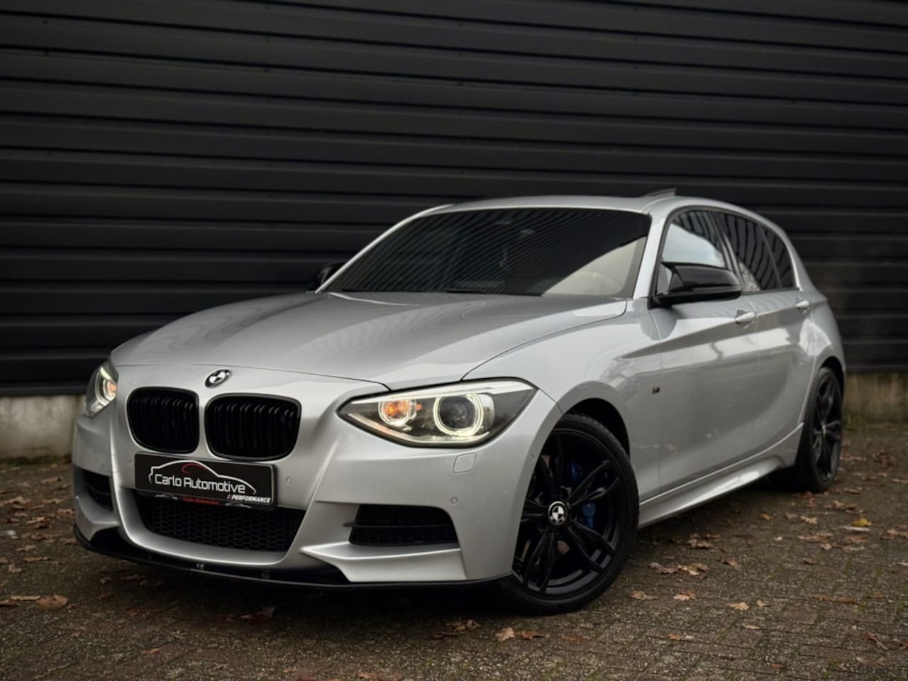 BMW 1-serie - M135i STAGE 2 DAK|MEMORY|H/K|CAMERA|LANE VOL! - AutoWereld.nl