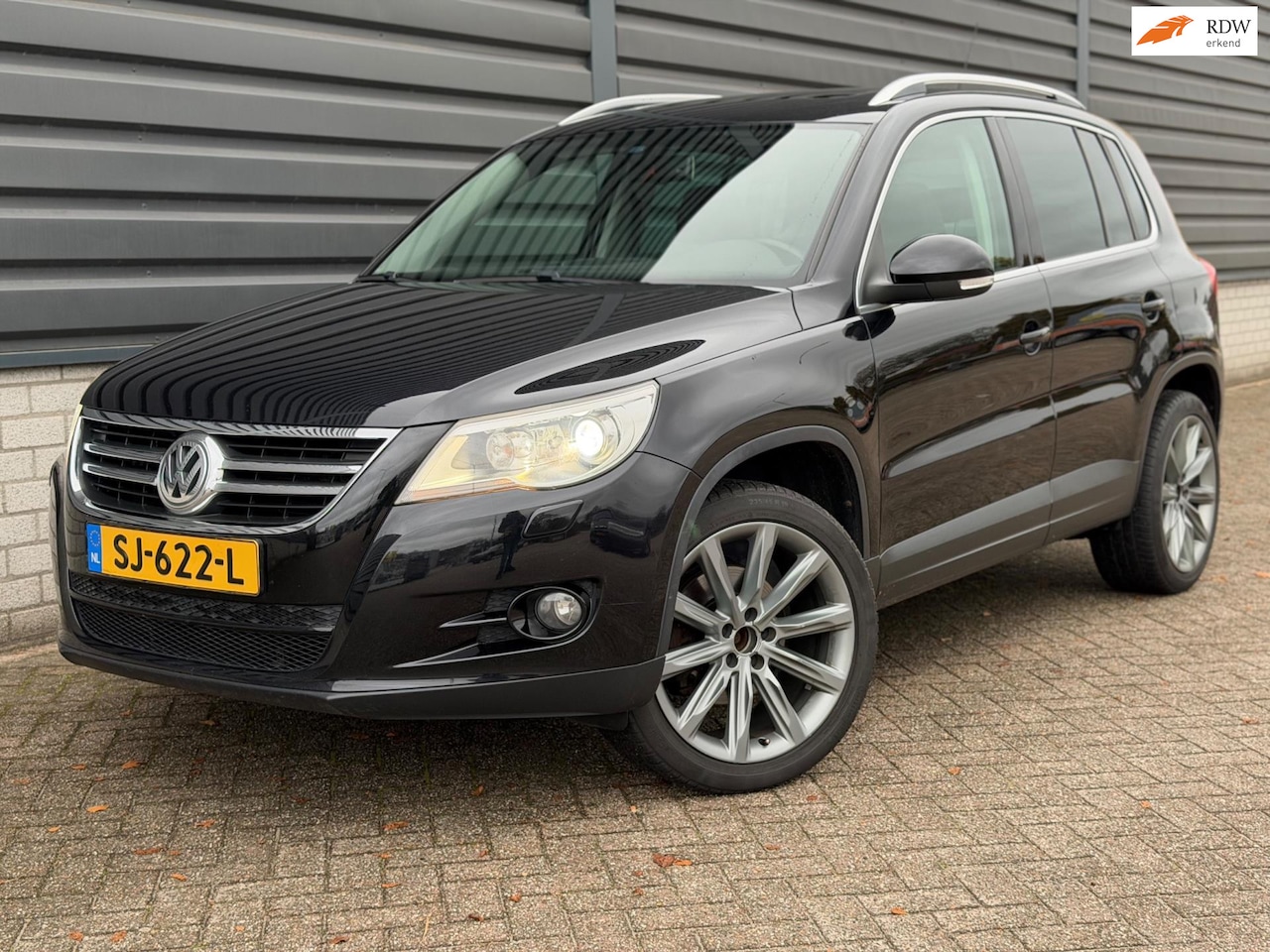Volkswagen Tiguan - 2.0 TSI Sport&Style 4Motion XENON, PANO, LEER - AutoWereld.nl