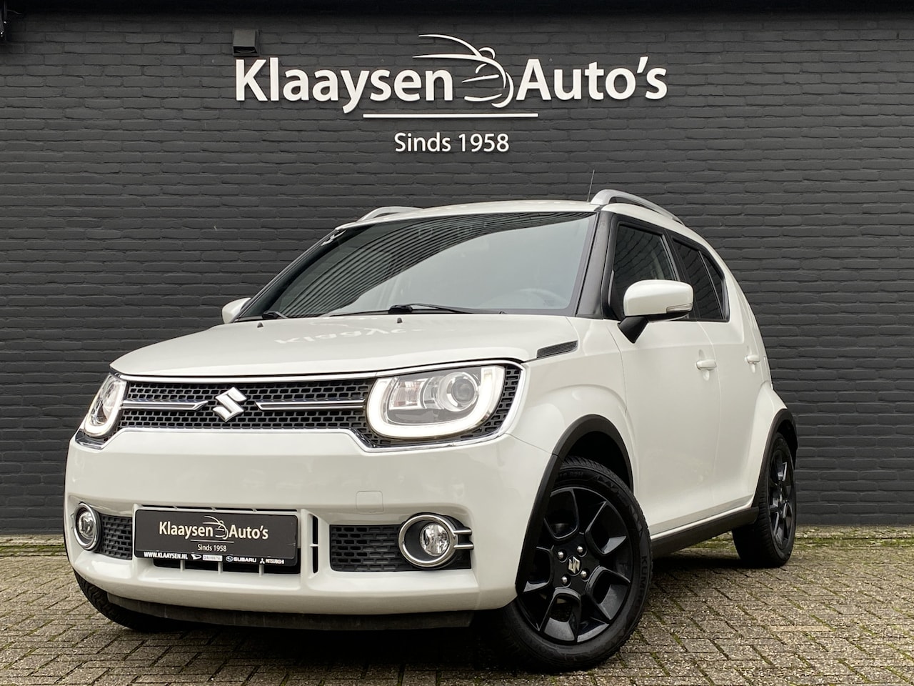Suzuki Ignis - 1.2 Stijl AUT. | navigatie | camera | climate control | stoelverwarming | keyless go | wit - AutoWereld.nl