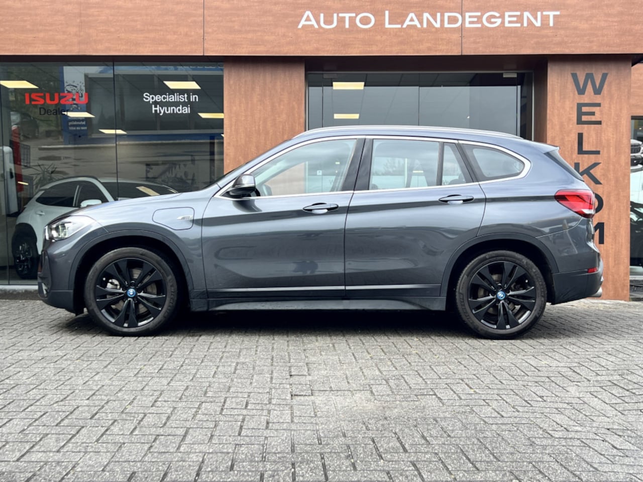 BMW X1 - xDrive25e eDrive Edition PHEV | Camera | NAV | Cruise control | Trekhaak - AutoWereld.nl