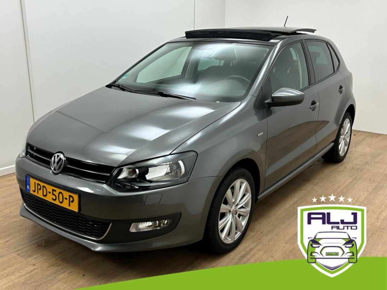 Volkswagen Polo - Occasion 1.2 TSI Highline | Grijs | Tweedehands Volkswagen Polo | Panoramadak | Bluetooth - AutoWereld.nl