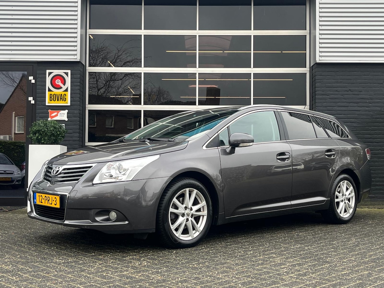 Toyota Avensis Wagon - 1.8 VVTi, Airco, Bluetooth, Cruise, Trekhaak, Navi, NAP - AutoWereld.nl