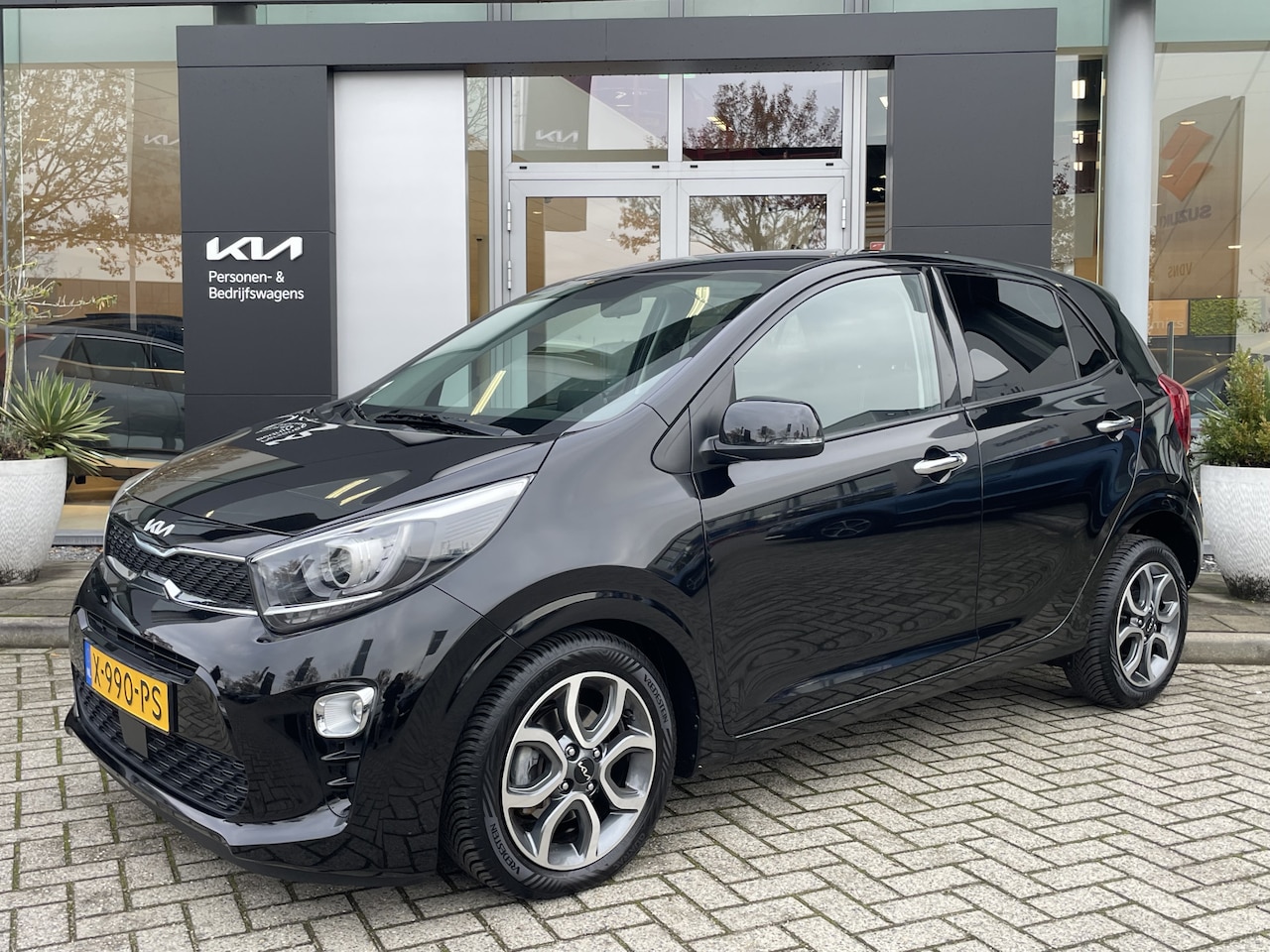Kia Picanto - 1.0 DPi DynamicPlusLine Navi | Camera | Lichtmetalen velgen info Frank Eijsbouts 0492-5889 - AutoWereld.nl