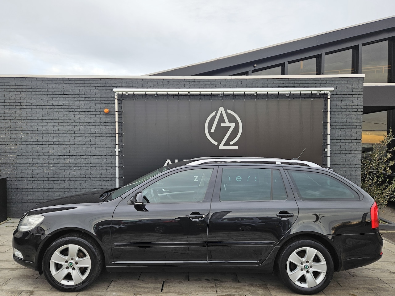 Skoda Octavia Combi - 1.4 TSI Greentech Elegance *AC*HeatSeat* - AutoWereld.nl