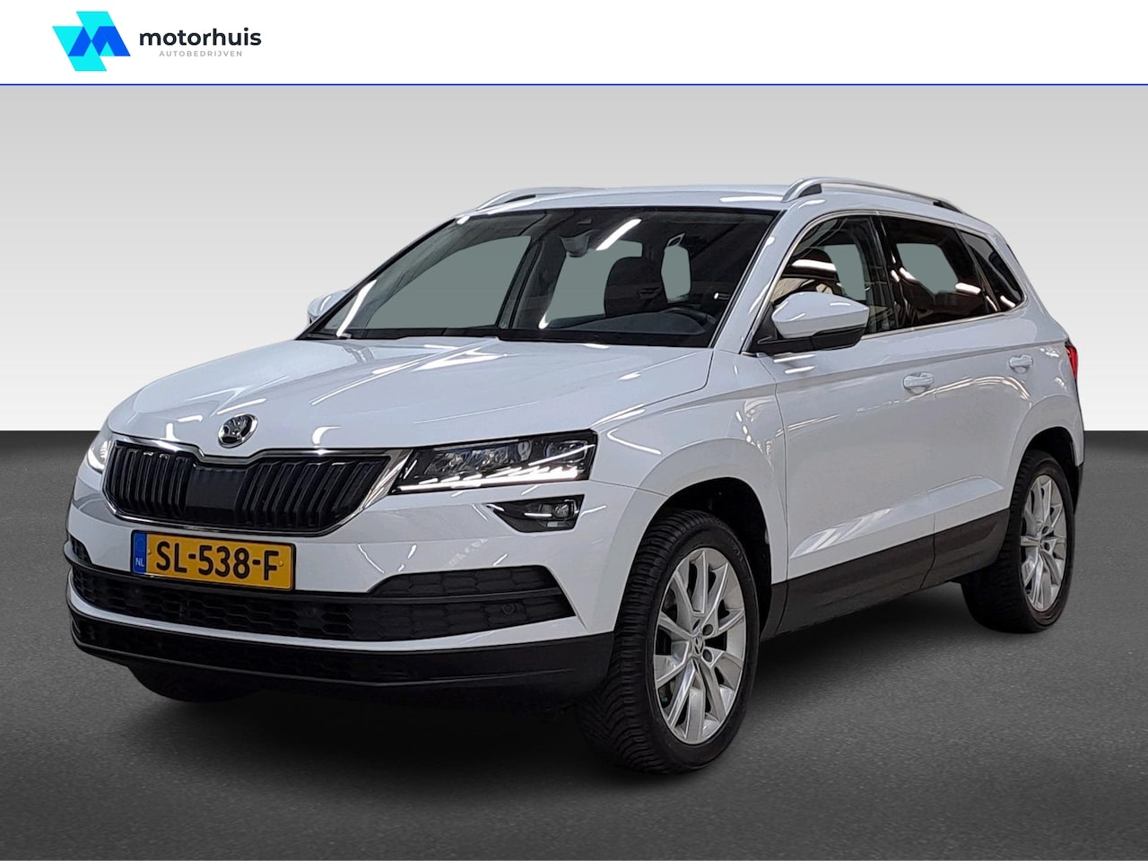 Skoda Karoq - 1.5 TSI 150PK DSG-7 STYLE BUSINESS NAVI TEL PDC LEDER NAP - AutoWereld.nl