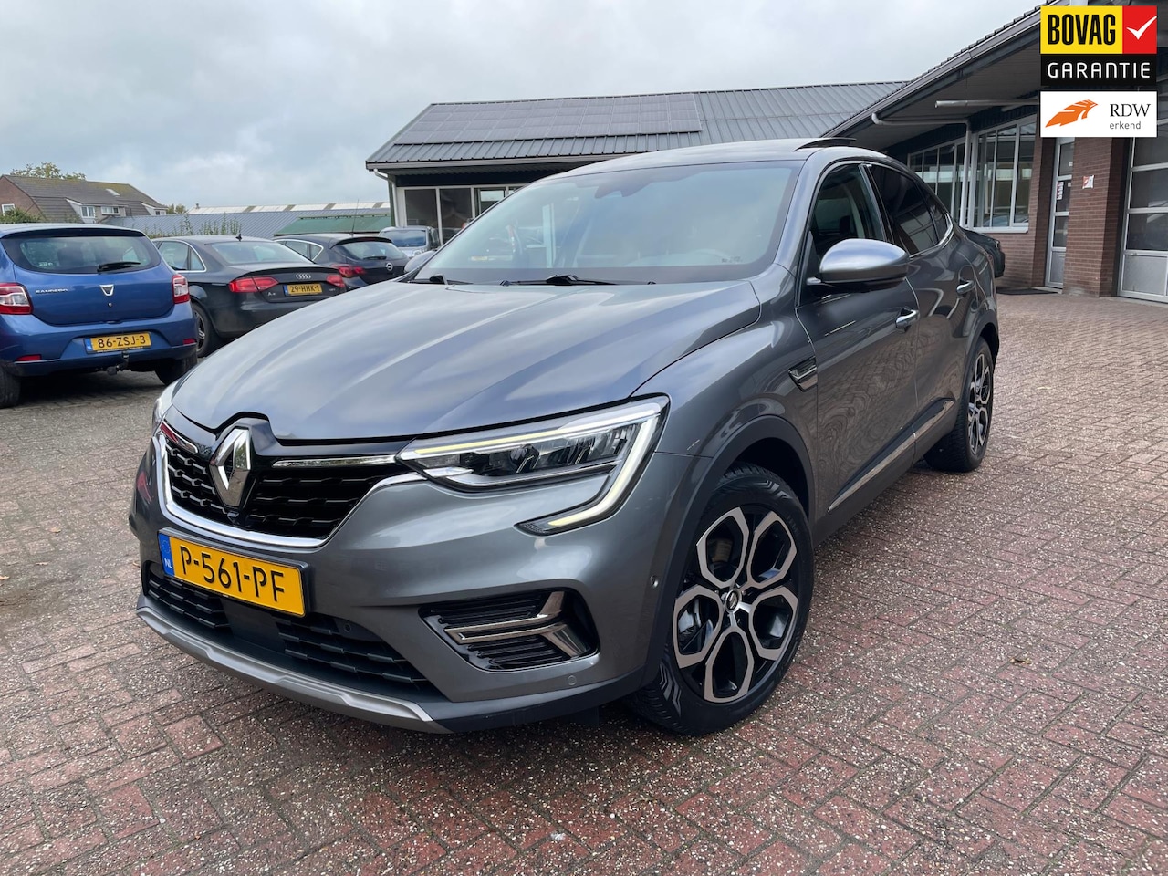 Renault Arkana - 1.6 E-Tech Hybrid 145 Intens, Schuifkanteldak, Clima, 360 Camera - AutoWereld.nl