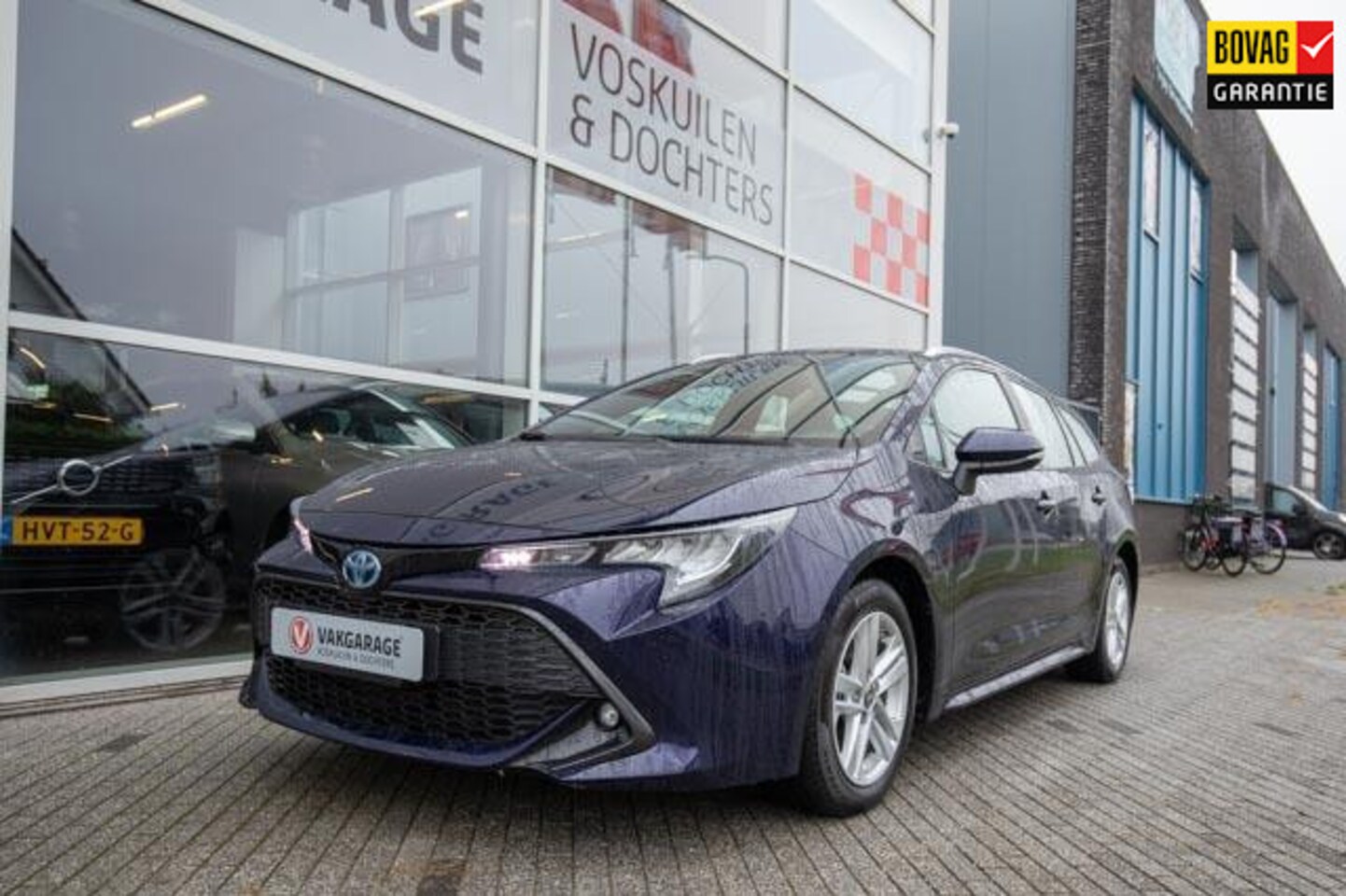 Toyota Corolla Touring Sports - 1.8 Hybrid Business | Stoelverwarming | Navigatie | Camera - AutoWereld.nl