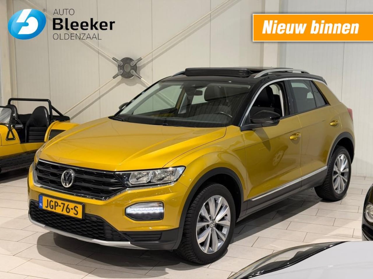 Volkswagen T-Roc - 1.0 TSI Style Pano Navi Airco PDC - AutoWereld.nl