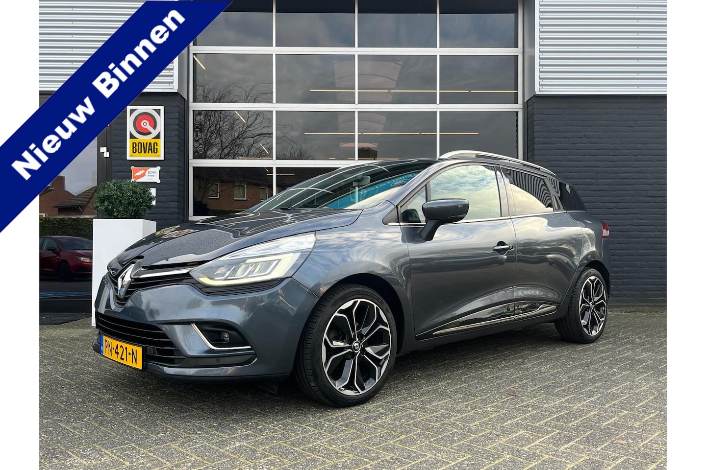 Renault Clio Estate - 1.2 Intens, Bluetooth, Camera, Cruise, Navi, Bose, 120 pk - AutoWereld.nl