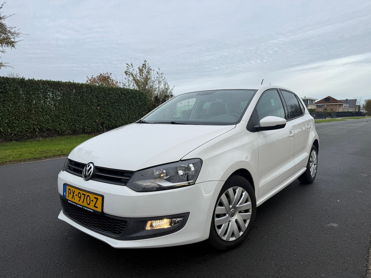 Volkswagen Polo - 1.2-12V Comfortline CLIMA/APK/CRUISE - AutoWereld.nl