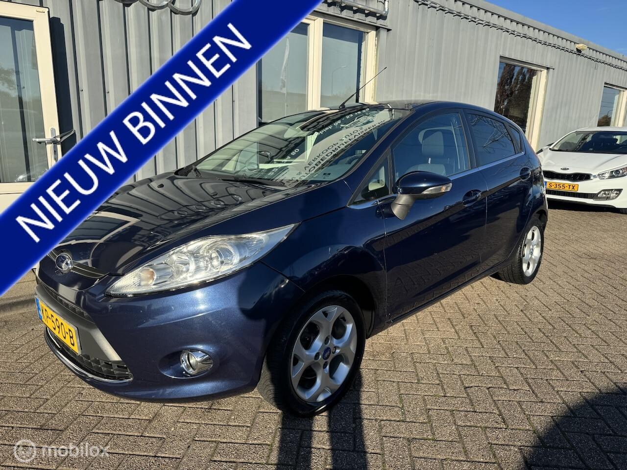 Ford Fiesta - 1.4 Ghia 1.4 Ghia - AutoWereld.nl
