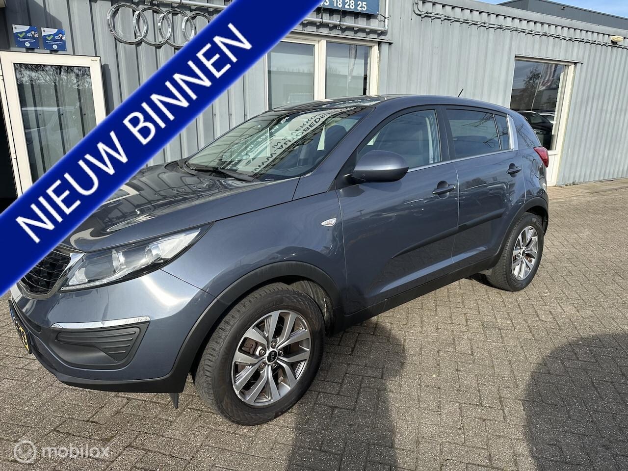 Kia Sportage - 1.6 GDI ComfortLine 1.6 GDI ComfortLine - AutoWereld.nl