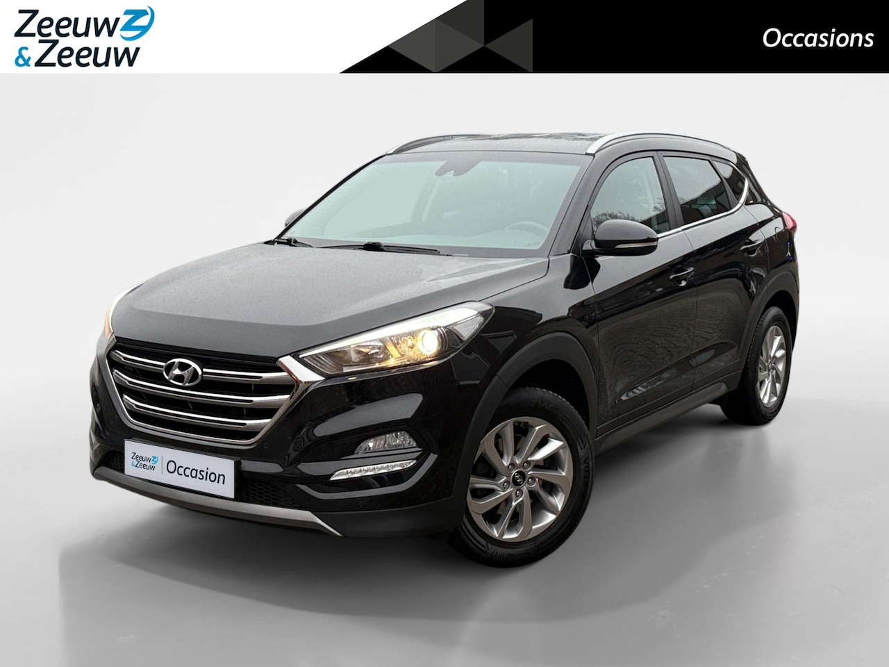 Hyundai Tucson - 1.6 GDi Comfort | Achteruitrijcamera | Stoelverwarming | Navigatie | Elektr. Inklapbare sp - AutoWereld.nl