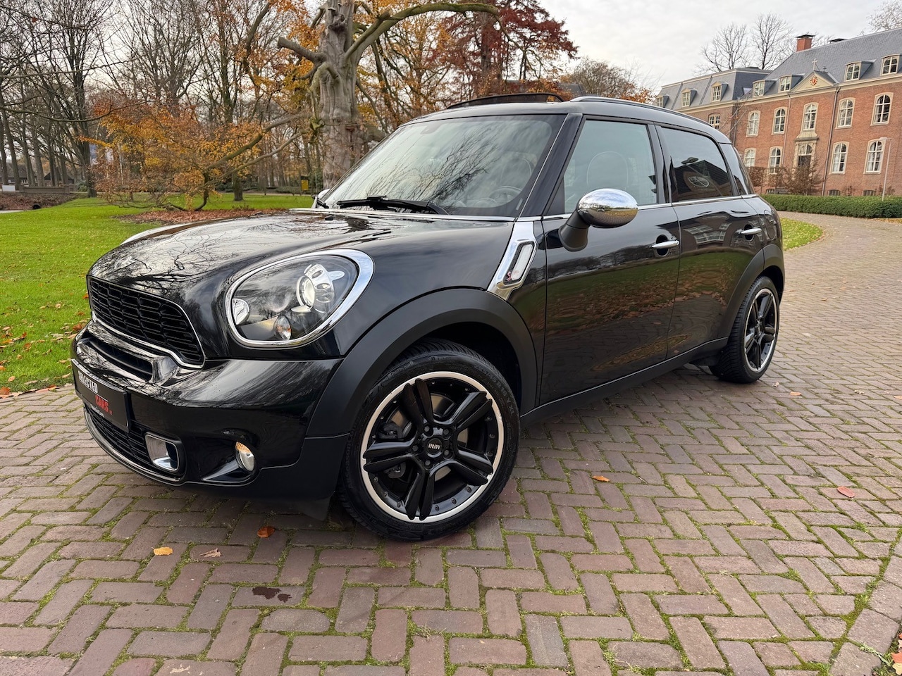 MINI Countryman - 1.6 Cooper S ALL4 Salt Mini Countryman 1.6 Cooper S All4 AUT 2012 Luxe Pakket Zwart Pano Leder Trekhaak - AutoWereld.nl