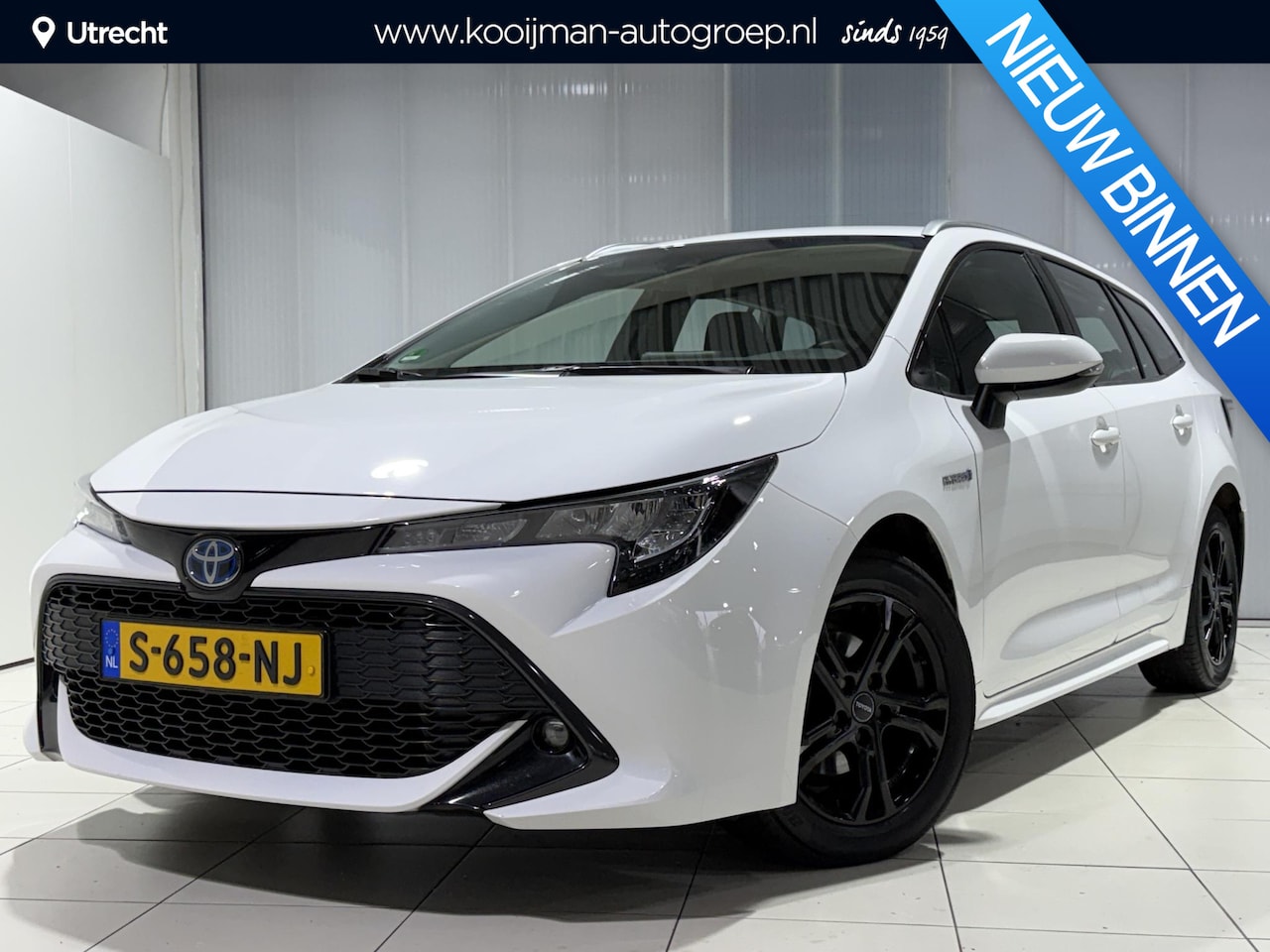 Toyota Corolla Touring Sports - 1.8 Hybrid Active | Trekhaak | Navigatie | Stoelverwarming | Goed onderhouden | - AutoWereld.nl