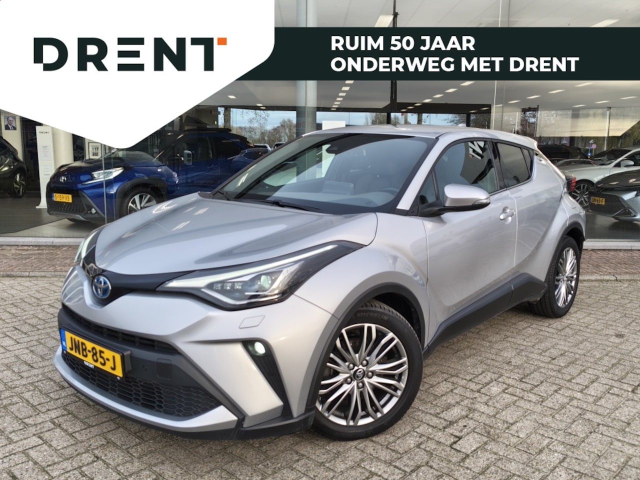 Toyota C-HR - 1.8 Hybrid Executive | Navi | Parkeersensoren | Leder/Stoffen be - AutoWereld.nl
