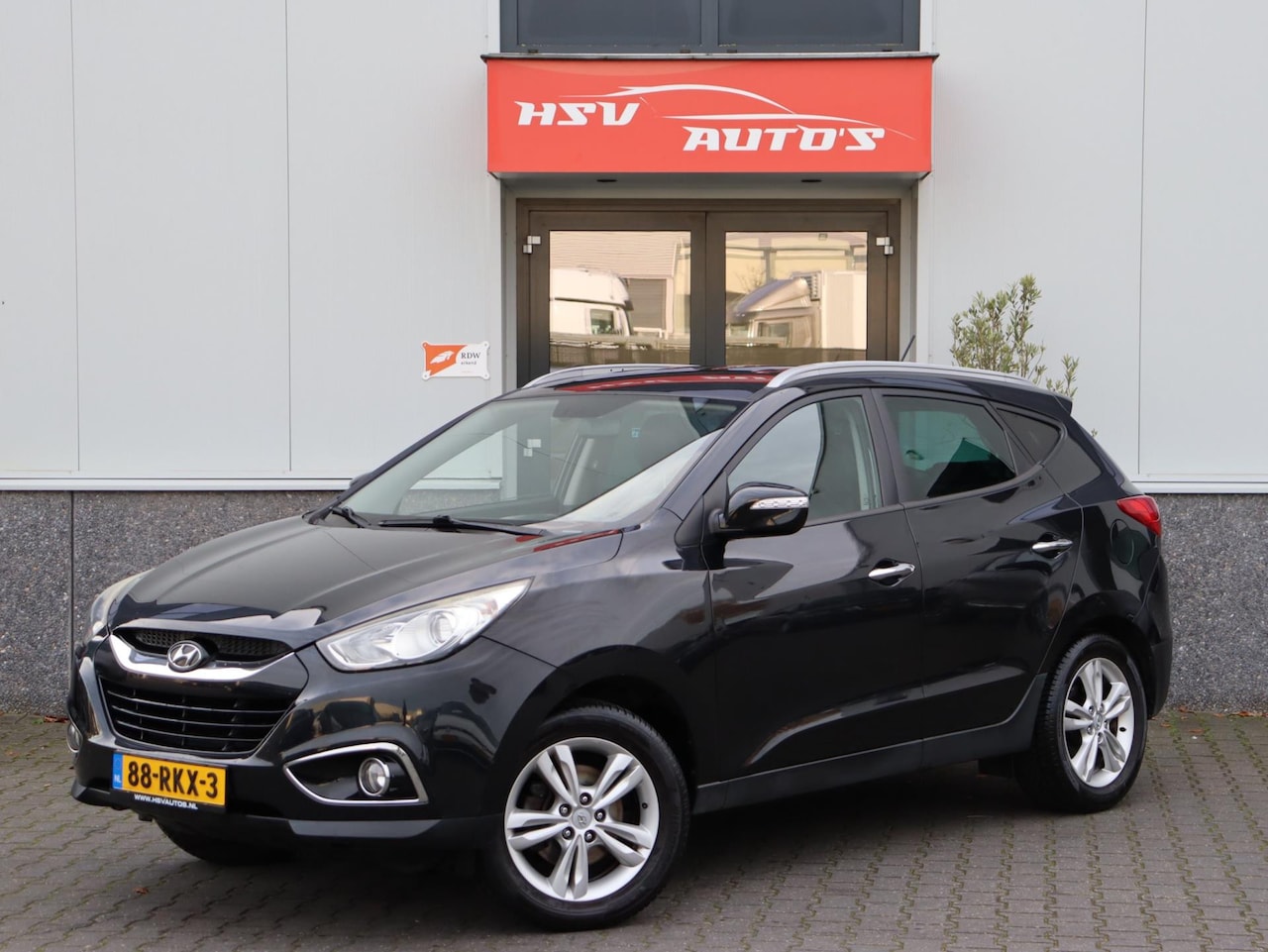 Hyundai ix35 - 2.0i Style airco H-Leer trekhaak - AutoWereld.nl