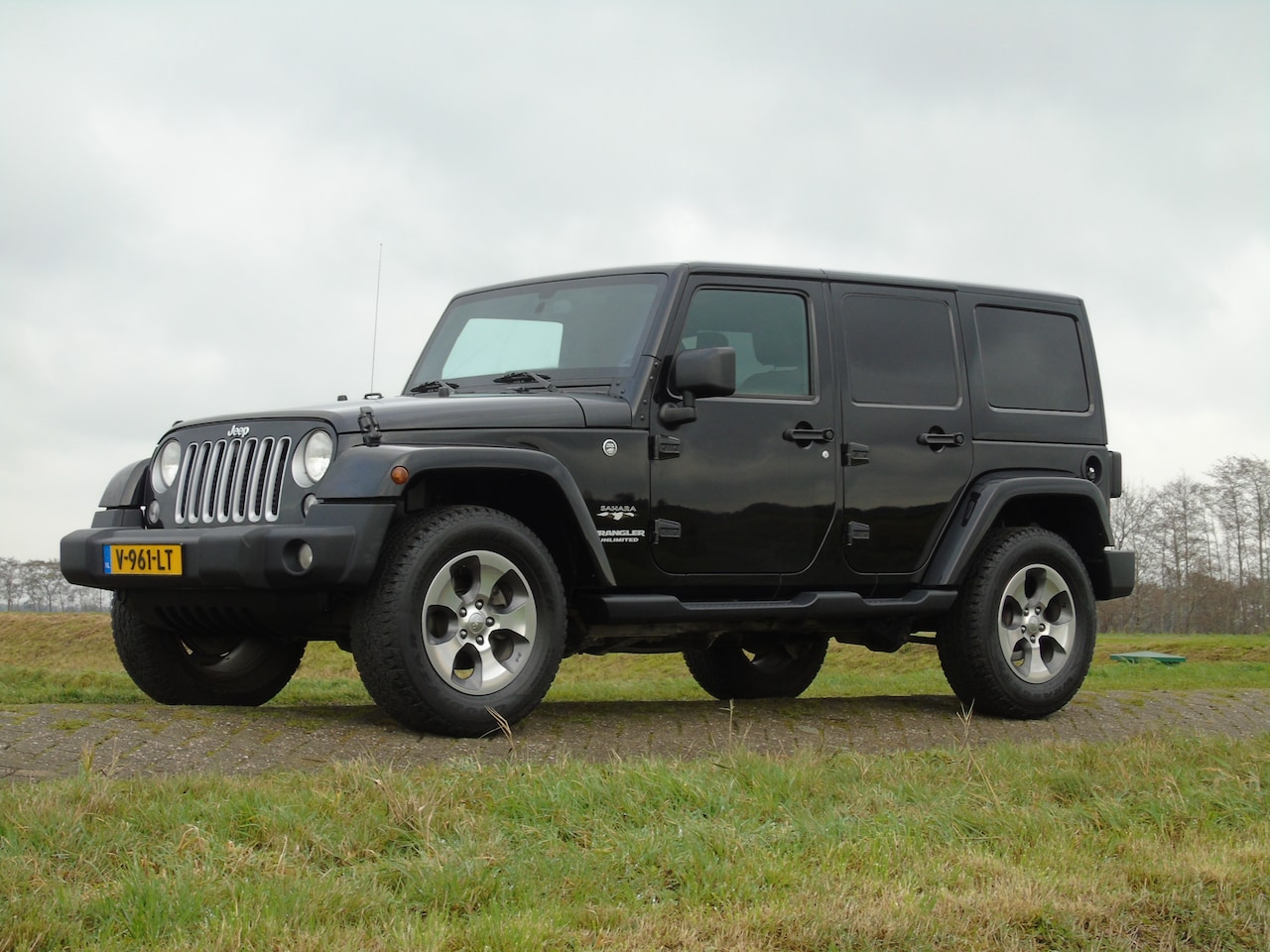 Jeep Wrangler - 2.8 CRD Sahara Grijs kenteken - AutoWereld.nl