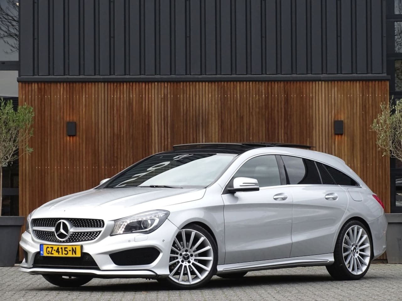 Mercedes-Benz CLA-klasse Shooting Brake - 180 automaat / AMG Ed. / panoramadak / LED *NAP* - AutoWereld.nl