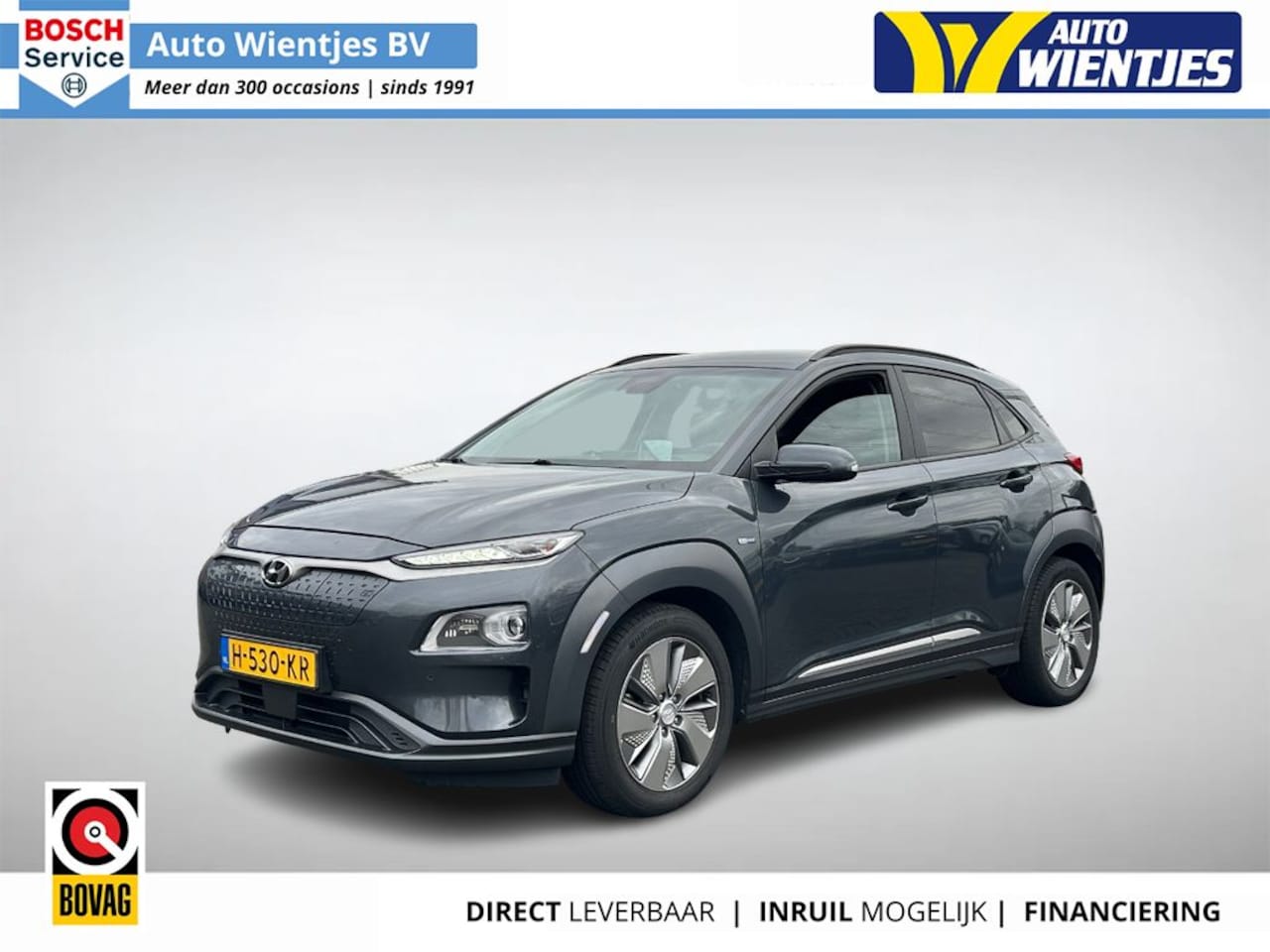 Hyundai Kona Electric - EV Premium 64kWh 3-Fase | SOH 98% | Leer | Navi - AutoWereld.nl