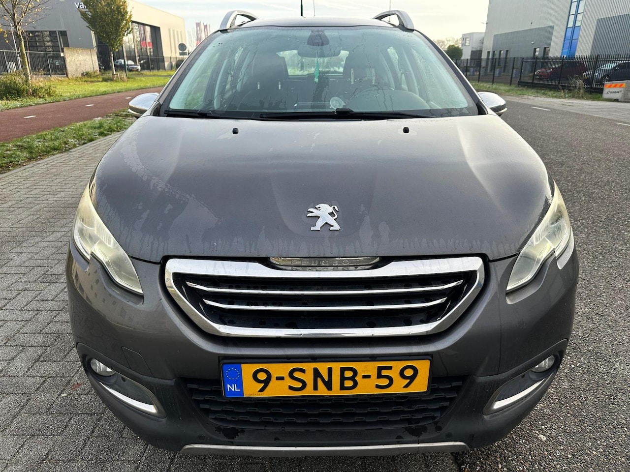 Peugeot 2008 - 1.2 VTi Allure Pack Premium Plus Airco Cruise Panodak - AutoWereld.nl