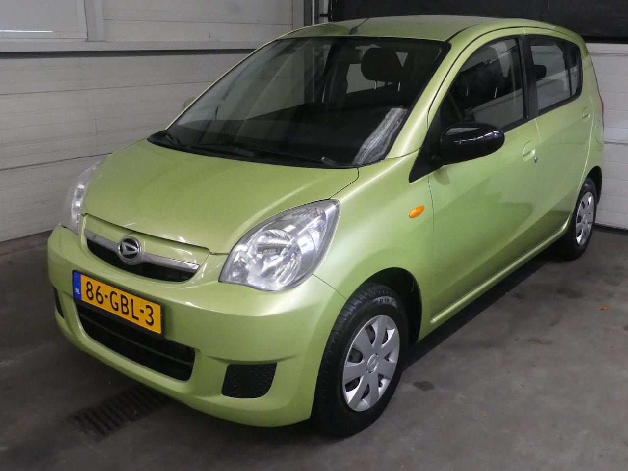 Daihatsu Cuore - 1.0 Premium - 1e eigenaar - Weinig KM NAP! - AutoWereld.nl