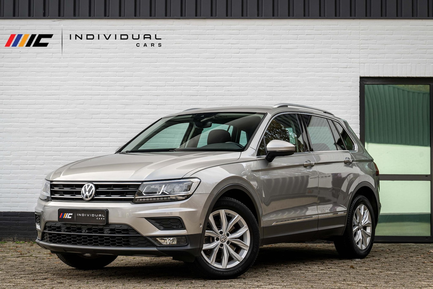 Volkswagen Tiguan - 2.0 TSI 4Motion Highline 2.0 TSI 4Motion Highline - AutoWereld.nl