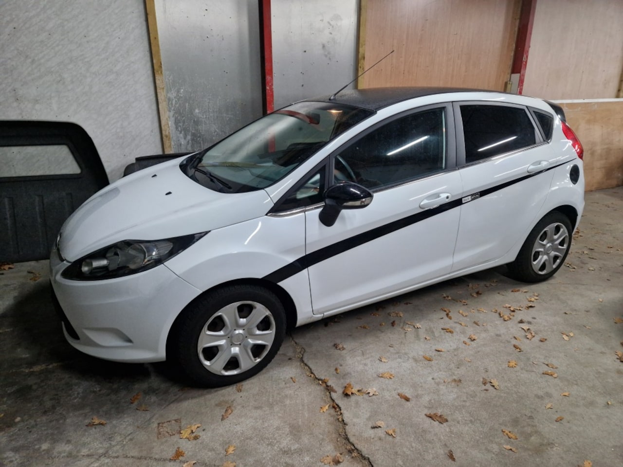 Ford Fiesta - 1.25 Limited Black & White 121DKM N.a.p.! - AutoWereld.nl
