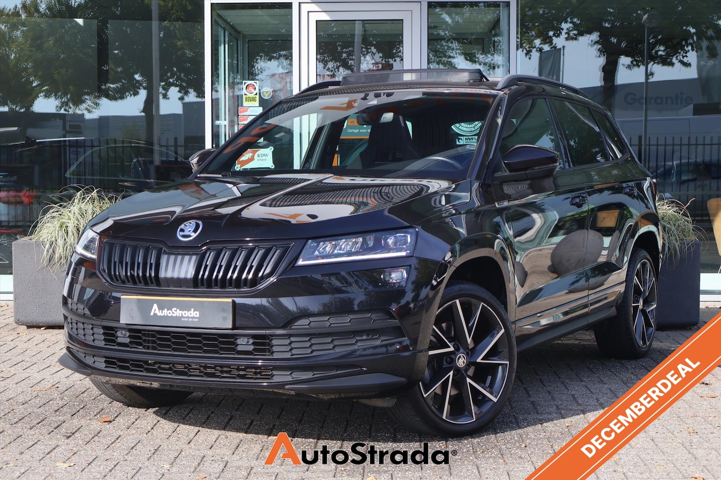 Skoda Karoq - 1.5 SportLine TSI 150pk | Trekhaak | Virtual | Canton | Camera | Pano | Carplay | Climate - AutoWereld.nl