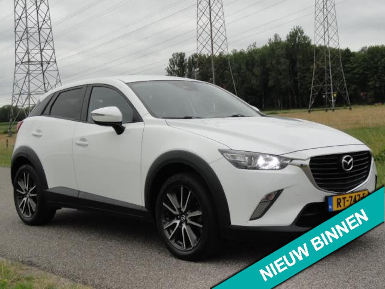 Mazda CX-3 - 2.0SkyActiv-G 120 Dynamic Met ECC I NAVIG I LED I TREKHAAK - AutoWereld.nl