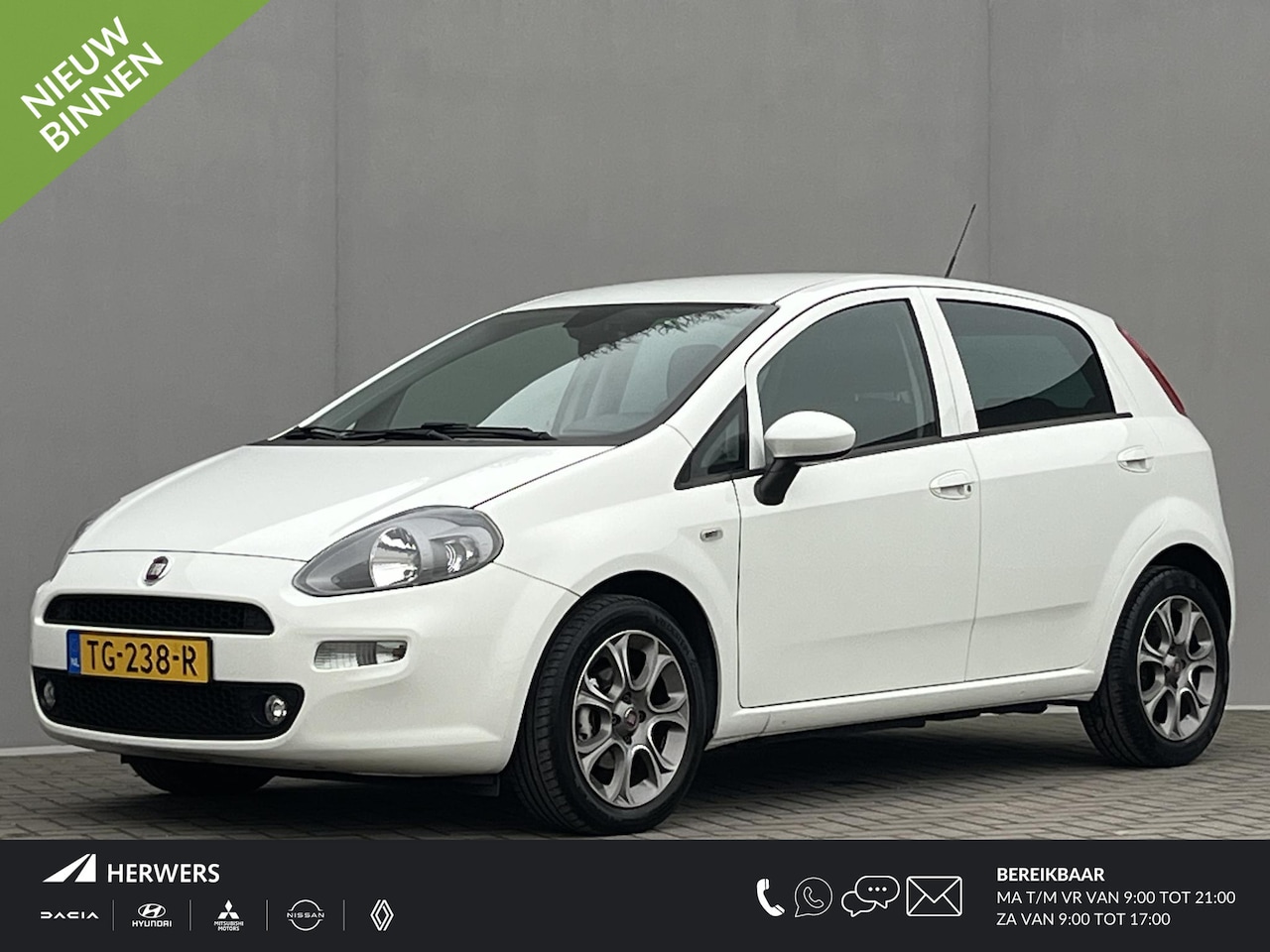 Fiat Punto Evo - 0.9 TwinAir Sempre / Cruise Control / Climate Control / Parkeersensoren Achter / Navigatie - AutoWereld.nl