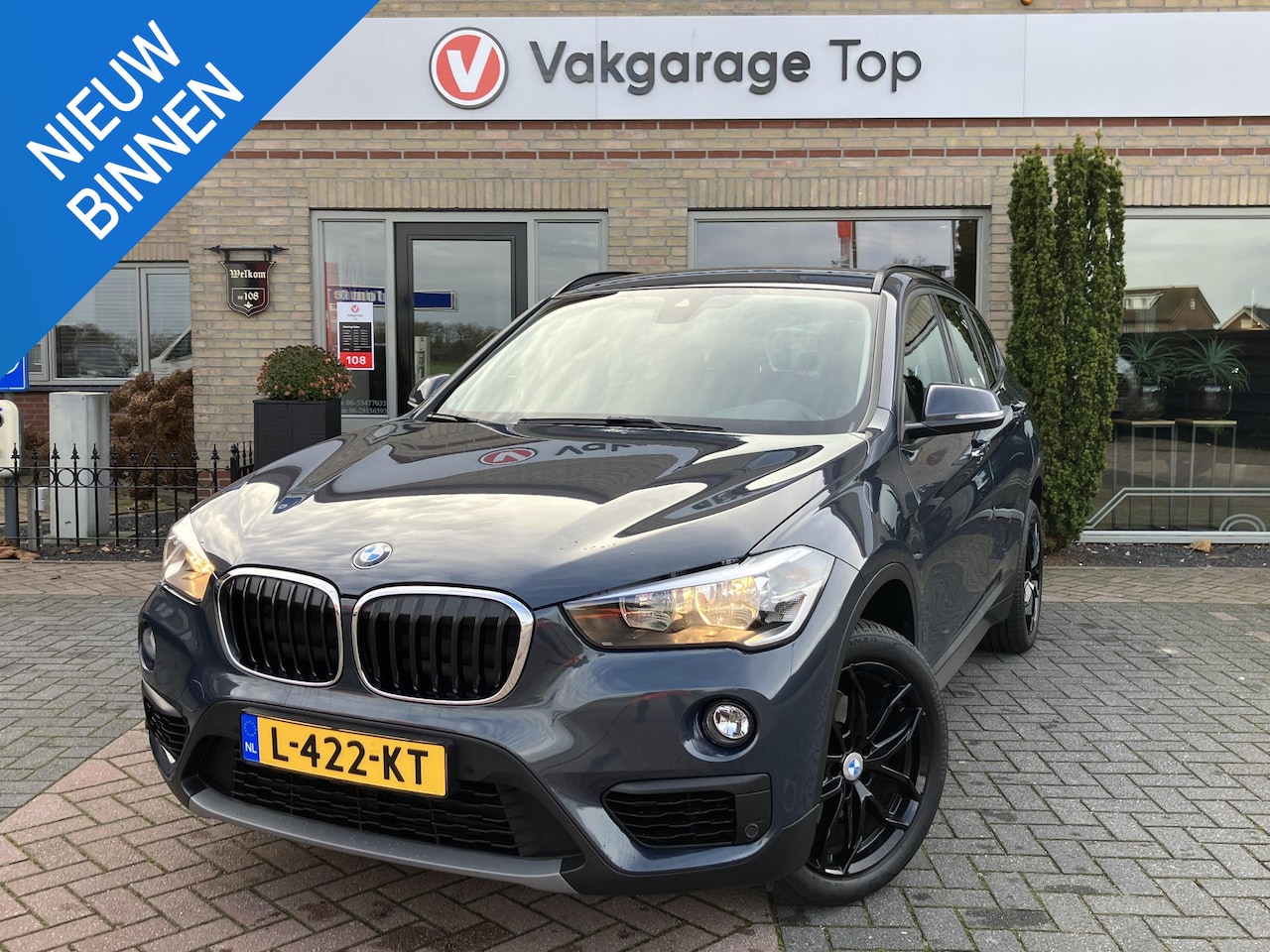 BMW X1 - sDrive18i High Executive | Trekhaak | Navi | Stoelverwarming - AutoWereld.nl