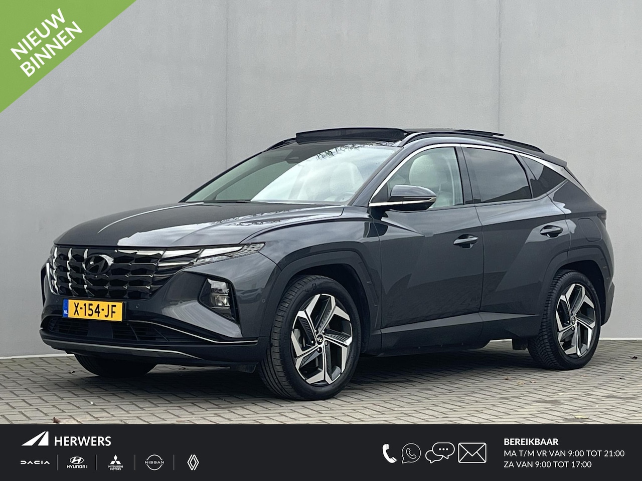 Hyundai Tucson - 1.6 T-GDI PHEV Premium 4WD / Afneembare Trekhaak (1350kg) / Schuif- Kanteldak / Apple Carp - AutoWereld.nl