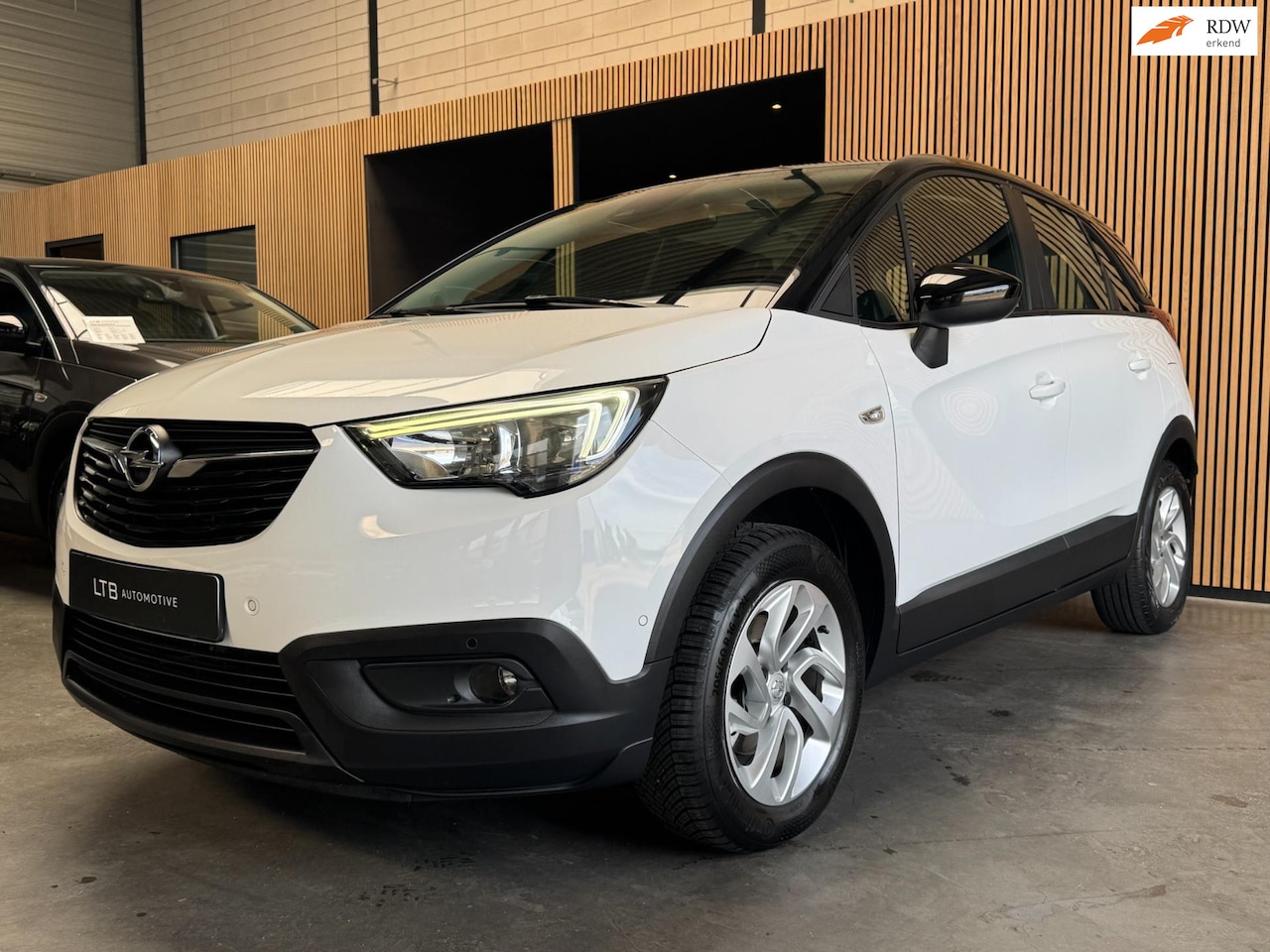 Opel Crossland X - 1.2 Turbo Innovation Automaat|Camera|Carplay|Cruise - AutoWereld.nl