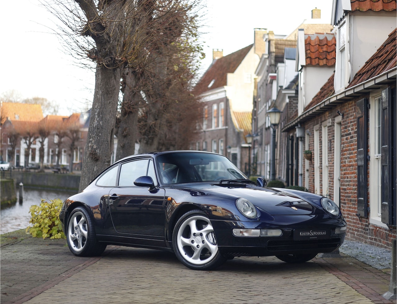 Porsche 911 - 3.6 Carrera 4 | 993 - Org. NL - Dealer odh. - Collectable - AutoWereld.nl