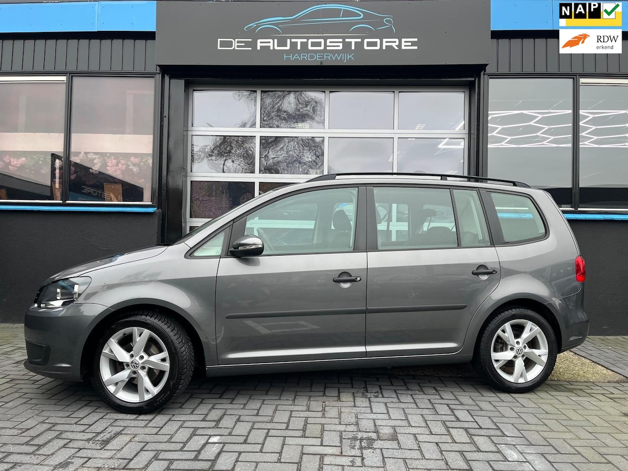 Volkswagen Touran - 1.2 TSI Trendline BlueMotion Airco Navi Cruise Pdc Dealer onderhouden!!! - AutoWereld.nl