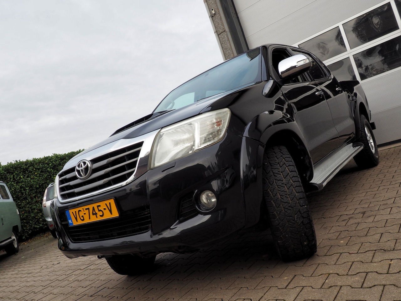Toyota HiLux - 3.0 D-4D-F 4WD GRIJS KENT. CLIMA CRUISE NAVI TREKH.