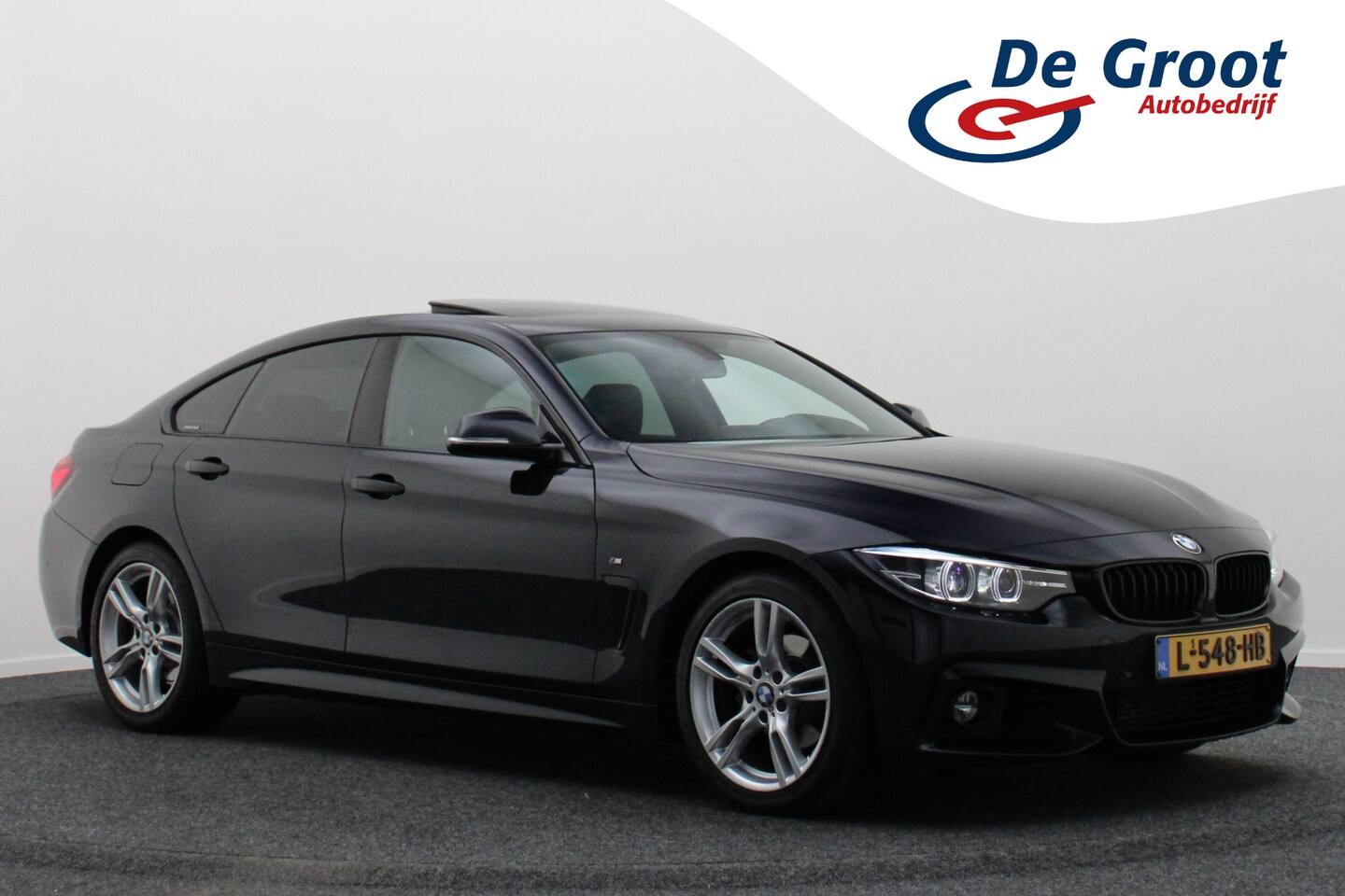 BMW 4-serie Gran Coupé - 418i Executive Edition M Sport Leer, Schuif-/Kanteldak, Head-Up, Camera, Navigatie, PDC - AutoWereld.nl