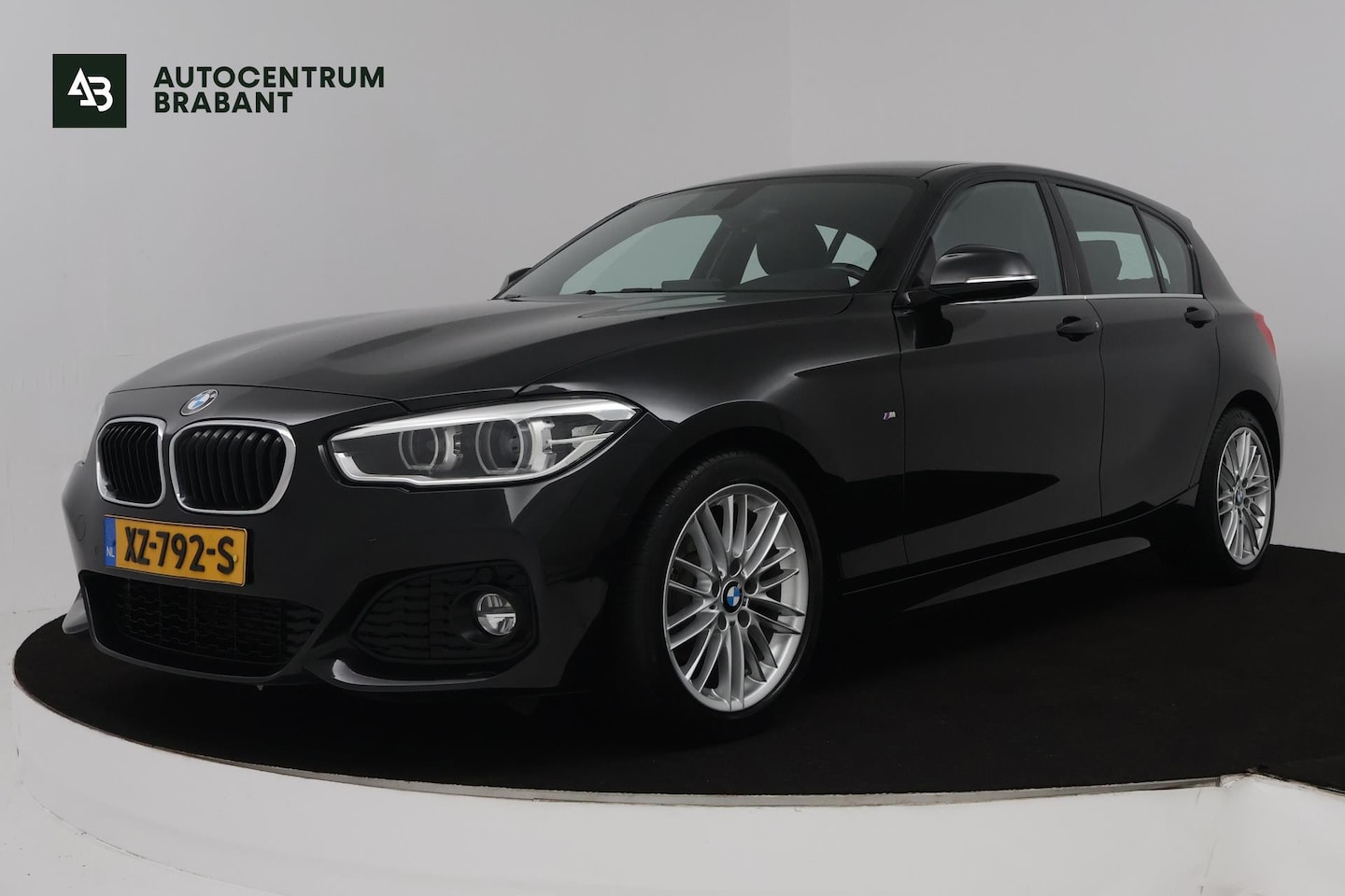 BMW 1-serie - 118i Edition M Sport Shadow High Executive (STOELVERWARMING, ACHTERUITRIJCAMERA, PARKEERSE - AutoWereld.nl