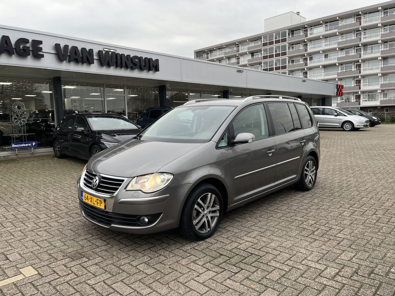 Volkswagen Touran - 1.4 TSI Highline Business Trekhaak Klima Cruise Lmv Nap Stoelverwarming - AutoWereld.nl
