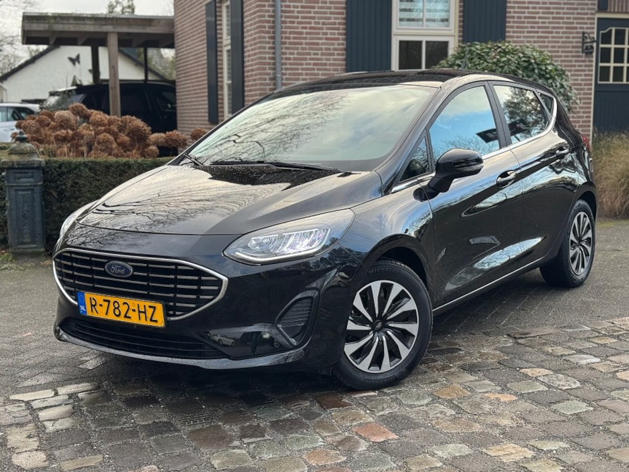 Ford Fiesta - 1.0 Hybrid Titanium ecc,navi,led,pdc,sportdop - AutoWereld.nl