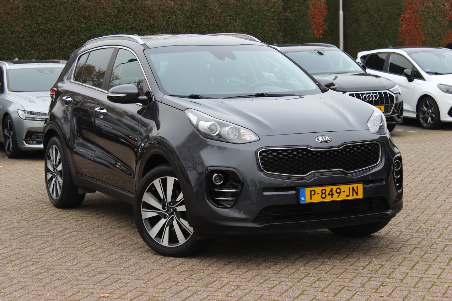 Kia Sportage - 1.6 GDI DynamicLine / Camera / Leder / Navigatie / 17'' / Stoelverwarming / DAB / Cruise C - AutoWereld.nl