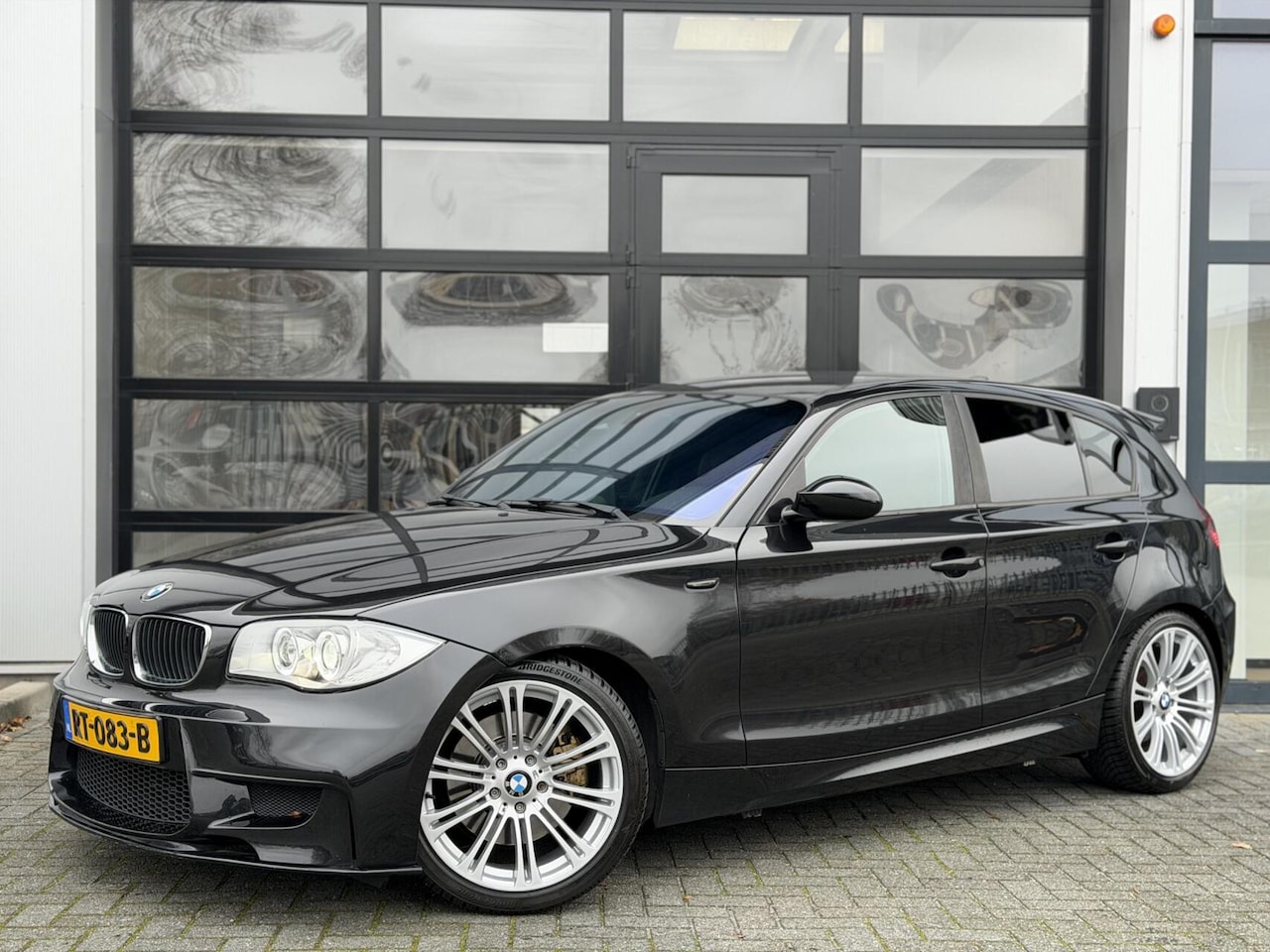 BMW 1-serie - 3.0 130i High Executive 265PK+ / M-Sport / HAND - AutoWereld.nl