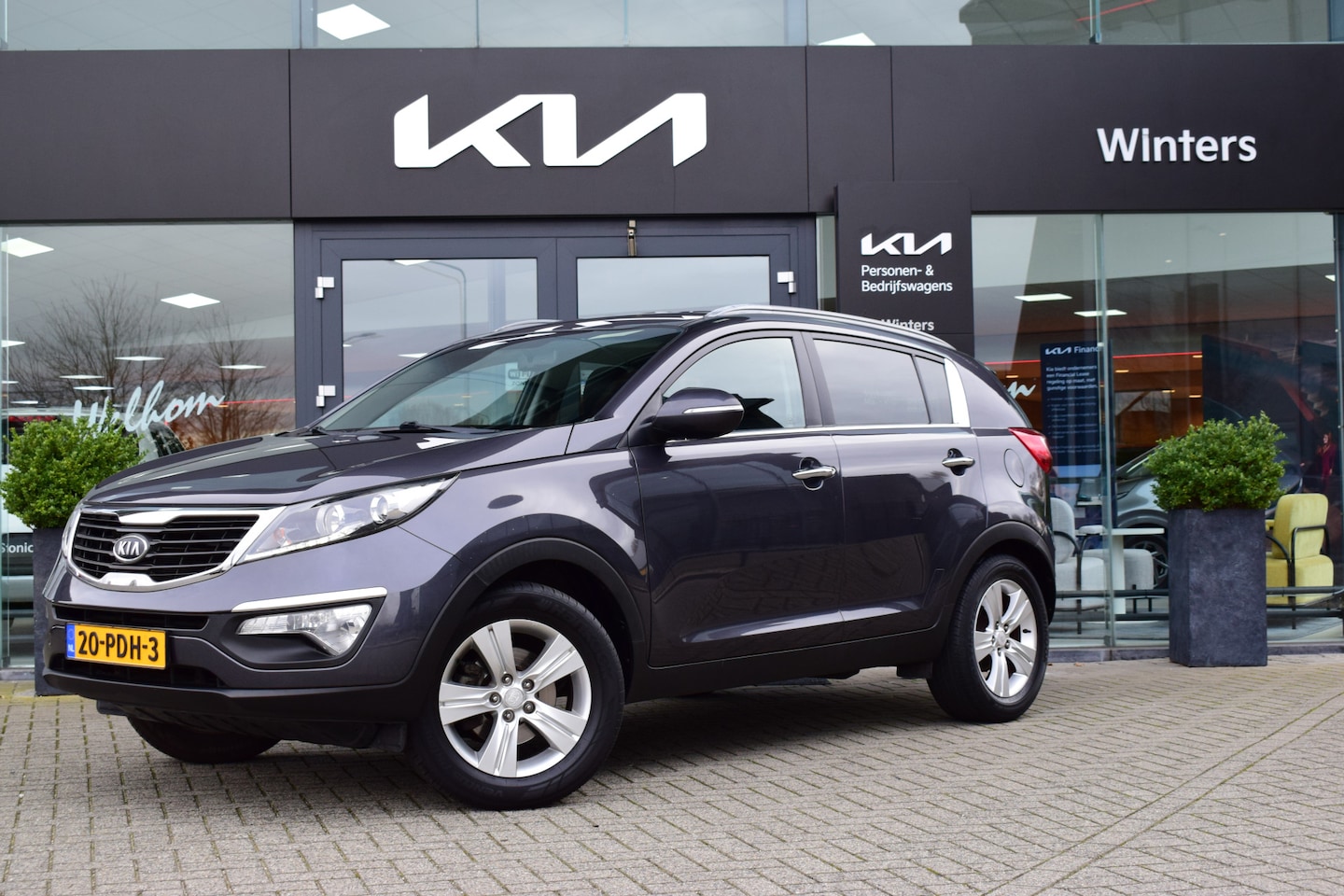 Kia Sportage - 2.0 X-ecutive Plus Pack | Cruise Control | Climate Control | Dealeronderhouden | Parkeerse - AutoWereld.nl
