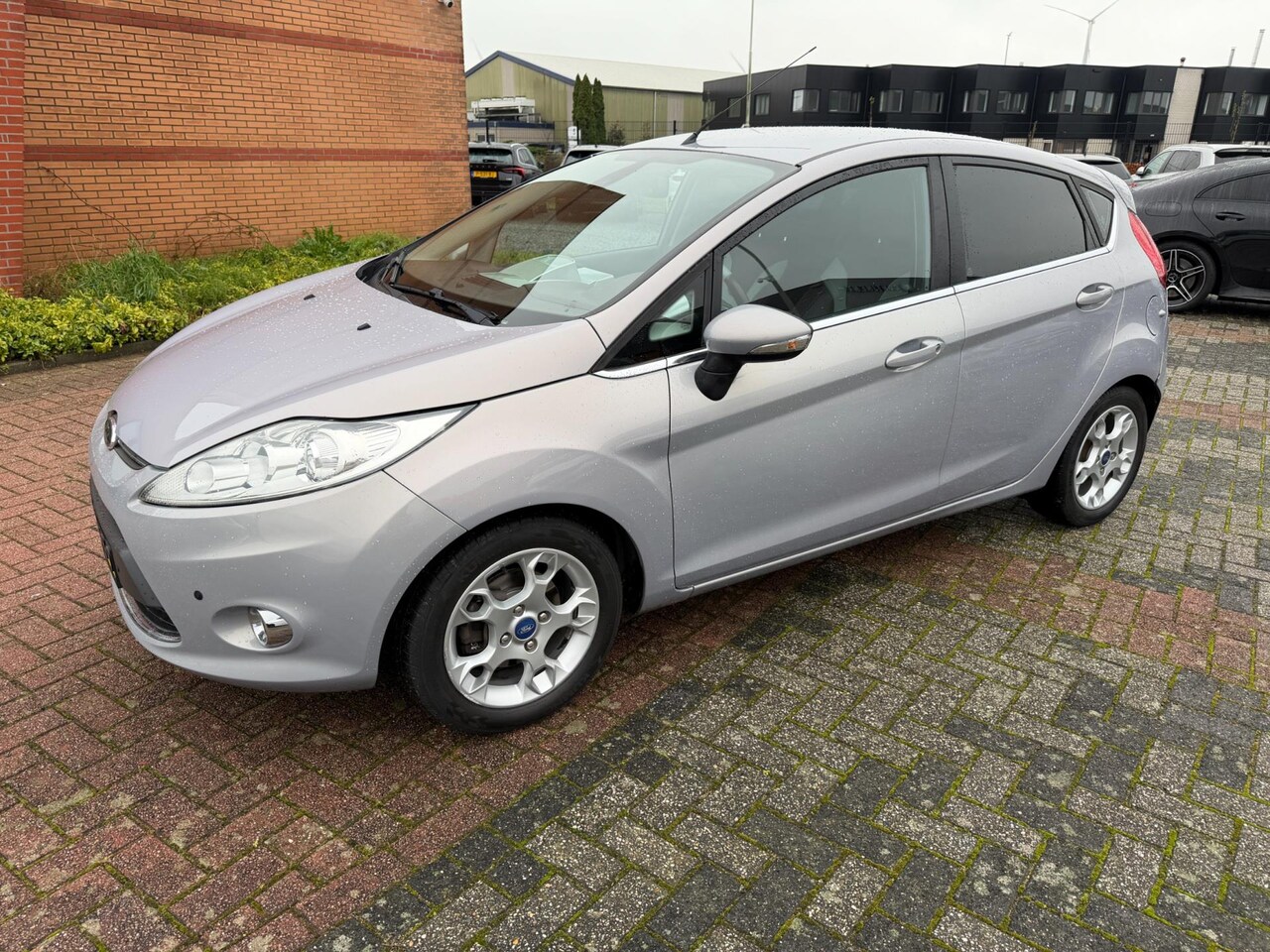 Ford Fiesta - 1.6 TDCi ECOnetic Titanium 1.6 TDCi ECOnetic Titanium, Leder, Navi, Trekhaak, PDC V+A - AutoWereld.nl